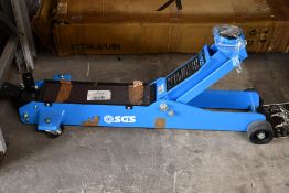 A SGS professional 3 Ton trolley jack (Model No TJ3PRO) lifting range 140 - 525 (Missing leaver hand