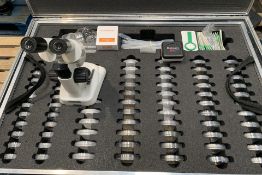 A box of Eight Microscopes, including a Moticam 1 800x600, petri dishes, pipettes, magnifying glasse