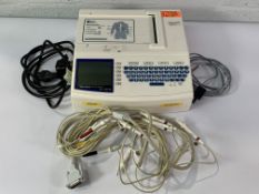 Mortara ELI 150 EKG Machine with power cable, ethernet cable and 10 Lead ECG cable. Pre-owned.