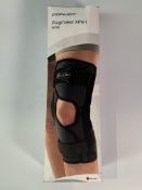 Playmaker Xpert Wrap KneeBrace, Black, Large. Damaged Box. Unused.