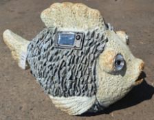 Thirty Three Solar Powered Ornamental Fish lights.