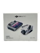 Pre-owned DJI Mini 4 Pro Drone (Faulty, sold for parts) with DJI RC 2 Remote Controller (Tested, wor