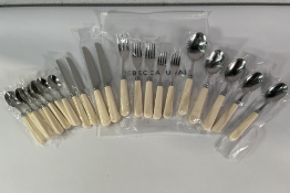 Twenty two pieces of Rebecca Udall Classic Cutlery 'Ivory': Four Knives, Five Forks, Five Table/Dese