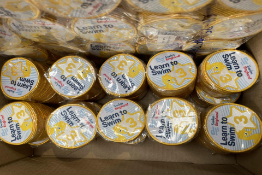 Thirty packs of 25 Swim England - Learn to Swim Level 3 Badges.
