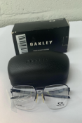 A pair of Oakley Sway Bar 0.5 Matte Midnight Demo Lens Glasses in case and box (00X5076).