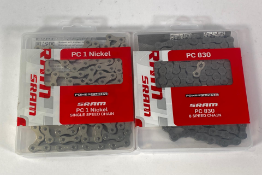 Two Sram PC 1 Nickel Single Speed Chains and three Sram PC 830 Eight Speed Chains.