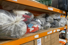 Nine bags of assorted clothing.