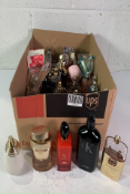 Approximately forty part used Perfume/Eau De Toilette to include Chanel, Lacoste, Versace, Chanel, H