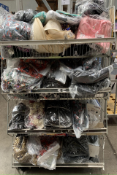 A large quantity of As New Clothing and Related Items (four shelves, basket not included).