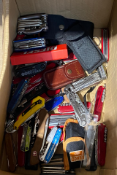A box of assorted multi tools to include Leatherman, Victorinox and Gerber.