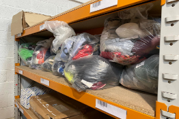 Nine bags of assorted clothing.