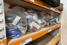 Nine bags of assorted clothing.