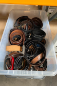 A box of assorted belts.