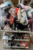 A quantity of Assorted As New Clothing (four shelves, basket not included).