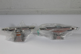 Two Stage 11 skateboard trucks to include 109 polished T hanger and 139 polished mid trucks.