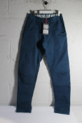 A pair of Looking For Wild Fitz Roy Climbing Pants in Blue Wing Teal, Size M.