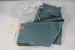 A pair of men's c'est normal 'The Jeans' (L).