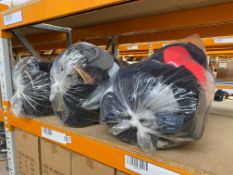 Three bags of assorted hats and caps.