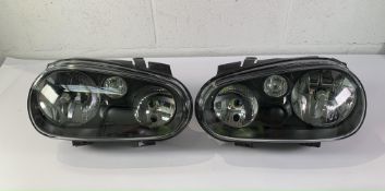 Set of TYC Volkswagen Left and Right Headlights (20-5386). Untested. As New.