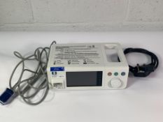A Nellcor PM100N Patient Monitoring System. Comes with some cables. Pre-owned.