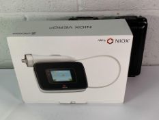 A Niox Vero (REF: 12-1200-EU), comes with power supply. Some cables and a hard case. Pre-owned.