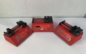 Three Aladdin Single Syringe Pump (MN: AL-100). Pre-owned (no cables/accessories, one has a smashed