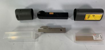 Two Various Machine Tools Pieces, One Sandvik Coromant DCLNR 2525M16 And One HSE 2020R-SE2403. New.