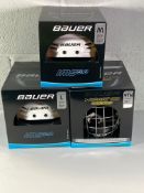 Three Buaer hockey helmets (2x IMS 5.0 1xL 1xM) 1xReakt 100 (youth).