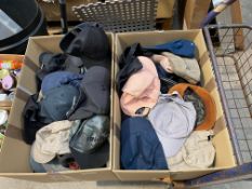 Two boxes of assorted hats/caps.
