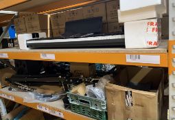 A quantity of musical and sound related items. As New and Pre-owned on two shelves.