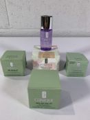 Clinique Beauty items to include Blended Face Powder, Charcoal Cleansing Balm, Puffiness Pouches