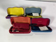 Eight Gucci velvet glasses cases (Various colours).