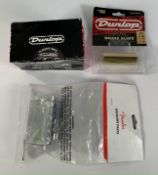 Guitar items to include Fender STD Bridge Assy RH SGGB VTCRB (0071014049) Dunlop Solid Brass Slide (
