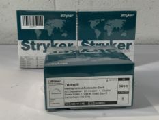 Three Stryker Trident Hemispherical Acetabular Shells (54mm, E, EXP: 2027-07-12, REF 502-11-52E). Al