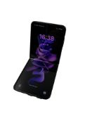 Pre-owned Smasung Galaxy Z Flip 3 (SM-F711B) 128GB in Black (https://www.checkmend.com/uk/verify/CM2
