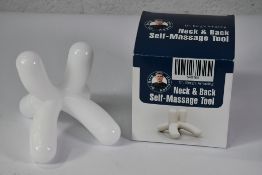 A Dr. Berg's Amazing Neck and Back Self-Massage Tool.