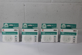 Four Ei208 Carbon Monoxide Alarms.