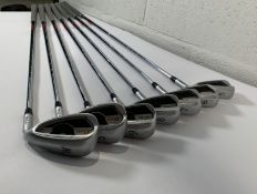 Seven pre-owned Ping G400 golf clubs to include 5/6/7/8/9 irons with sand and pitching wedge.