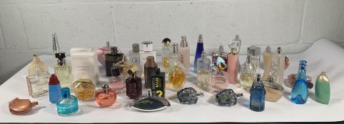 Forty assorted part used perfume/eau de toilette to include Kouros, DKYN, Lacoste, Yardley, Hugo Bos