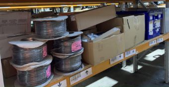 Electrical and Plumbing Related Items on one shelf.