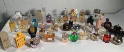 Forty assorted part used perfume/eau de toilette to include Marc Jacobs Daisy, Lacoste, Emporio Arma