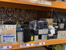 A quantity of assorted as new and used Batteries on half a shelf.