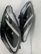 Pre-owned pair of Aston Martin DB12 Headlamps.