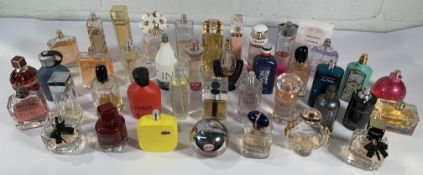Forty assorted part used perfume/eau de toilette to include Gucci Floral, Lacoste, Prada, Marc Jacob