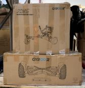 Gyroor Hoverboard with K2E Hoverboard Kart attachment, red, both boxes opened in original packaging.