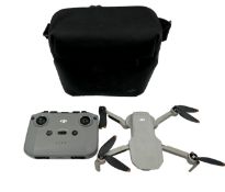 Pre-owned DJI Mini 2 Drone (Account locked, sold for parts) with 3 x batteries, charging dock, contr