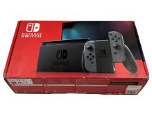 Pre-owned Nintendo Switch (HAC-001-01) with Joy-Con's, Charger and Dock Included (EAN: 045496882167)
