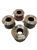 Four as new reels of cable to include; 2 xi 100m 2.5mm black power cable, 100m 2.5mm red power cable