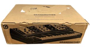 Pre-owned Moog Grandmother 32-Key Semi-Modular Analog Synthesizer (EAN: 040232613395) (Boxed).