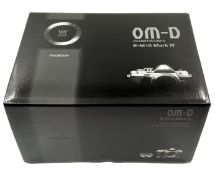As new Olympus OM-D E-M10 Mark IV 20MP Mirrorless Camera with 14-42mm Lens (EAN: 4545350053321)